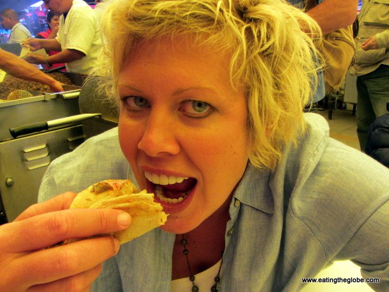 Valen eats Valen eating cecina taco at Tuesday Market/“El Tianguis”